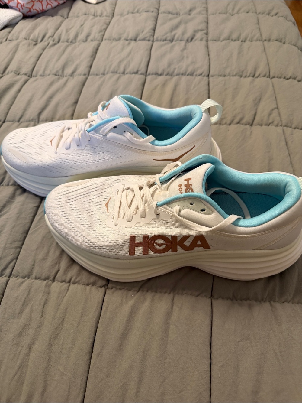 Hoka White Sneakers with Teal Lining and Rose Gold Logo.Clean,excellent conditi